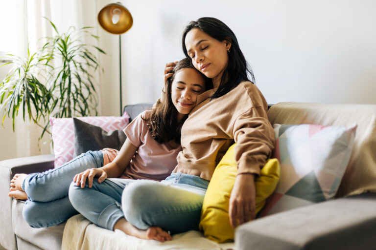 Single parenthood. Mother and daughter spending time together at home